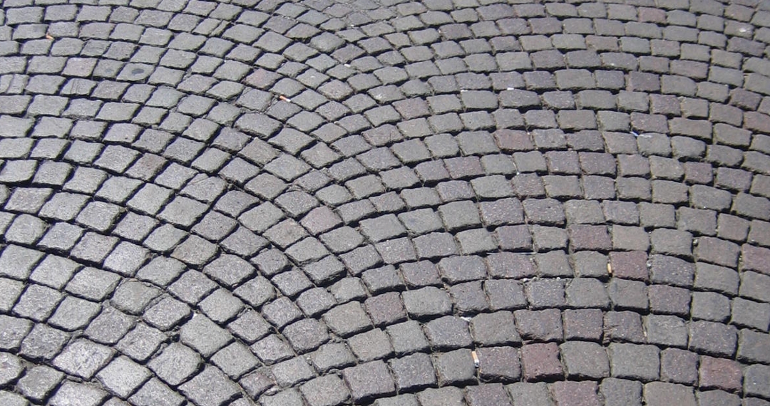 Ancient cobblestones in Italy laid in radial pattern